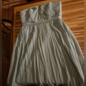 Green knee length formal dress